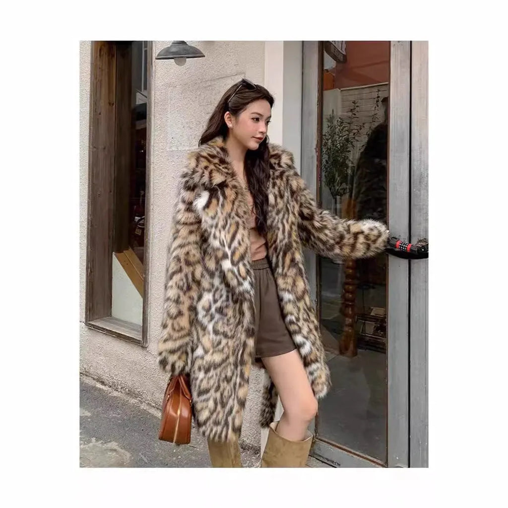 Long faux fur coat with fox print design, fur collar, and pockets in a street fashion style.