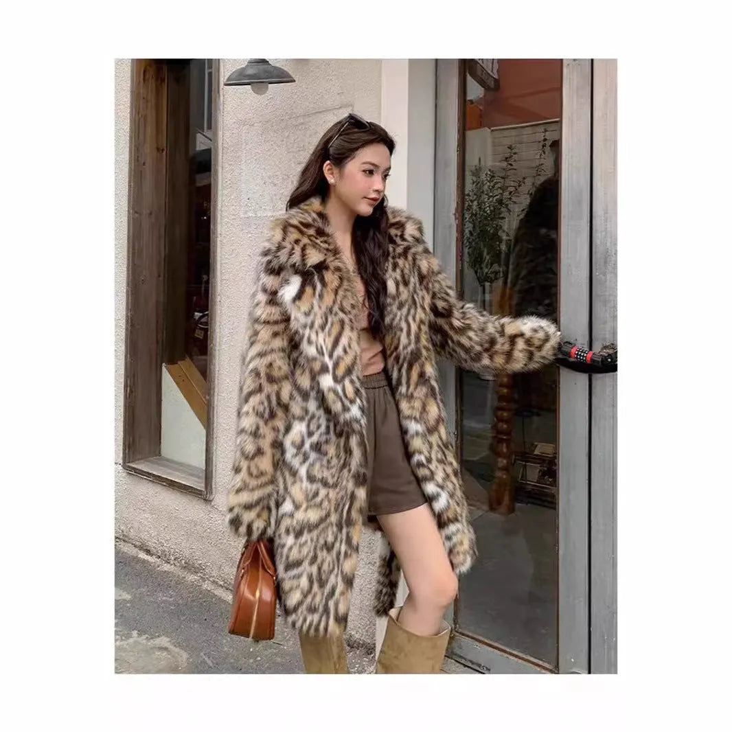 Long faux fur coat with fox print design, fur collar, and pockets in a street fashion style.