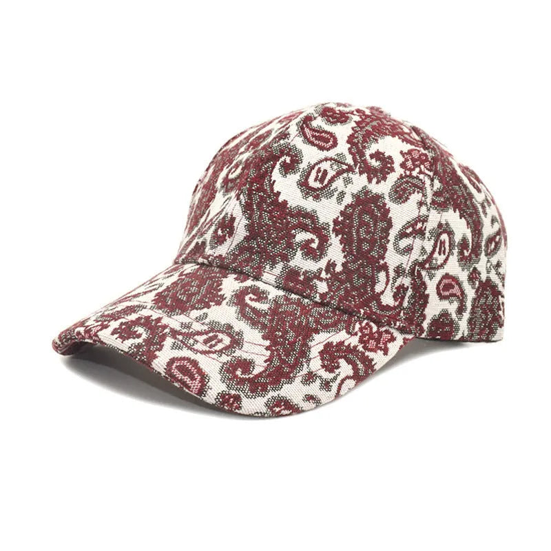 Unisex baseball cap with printed paisley pattern in blue colour option showing dome crown design