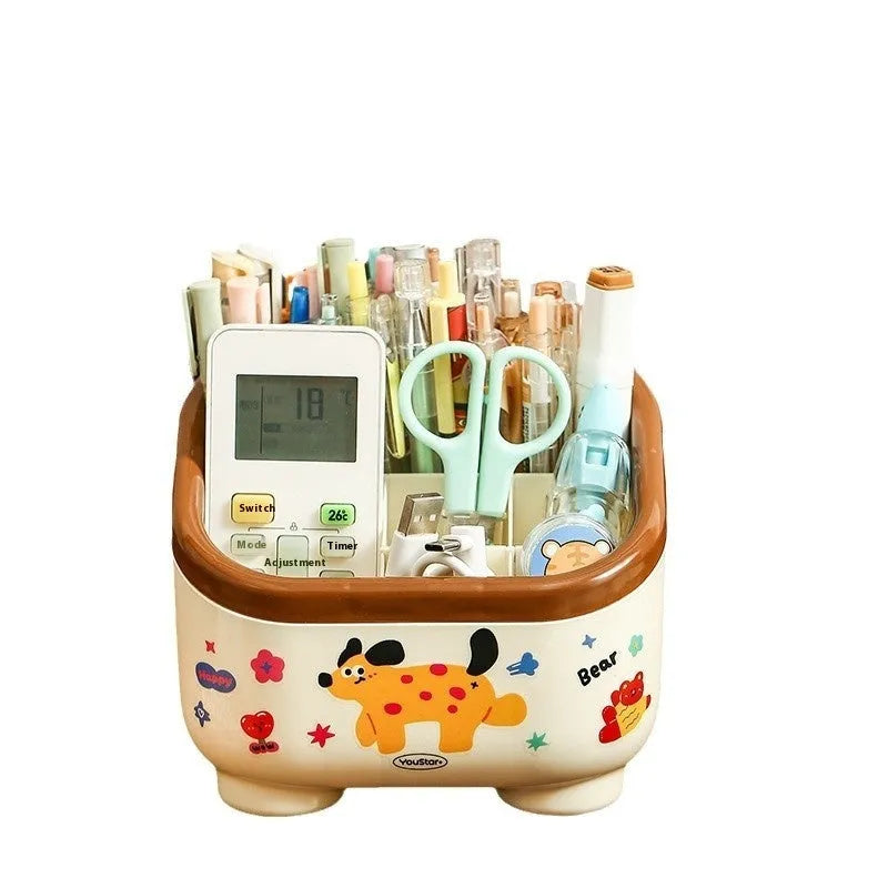 Cartoon-style plastic desktop organiser with grid compartments and labelling stickers for stationery storage