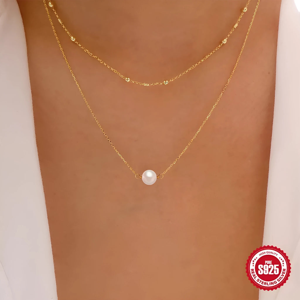 S925 sterling silver double layer necklace with twin pearl accents in gold colour