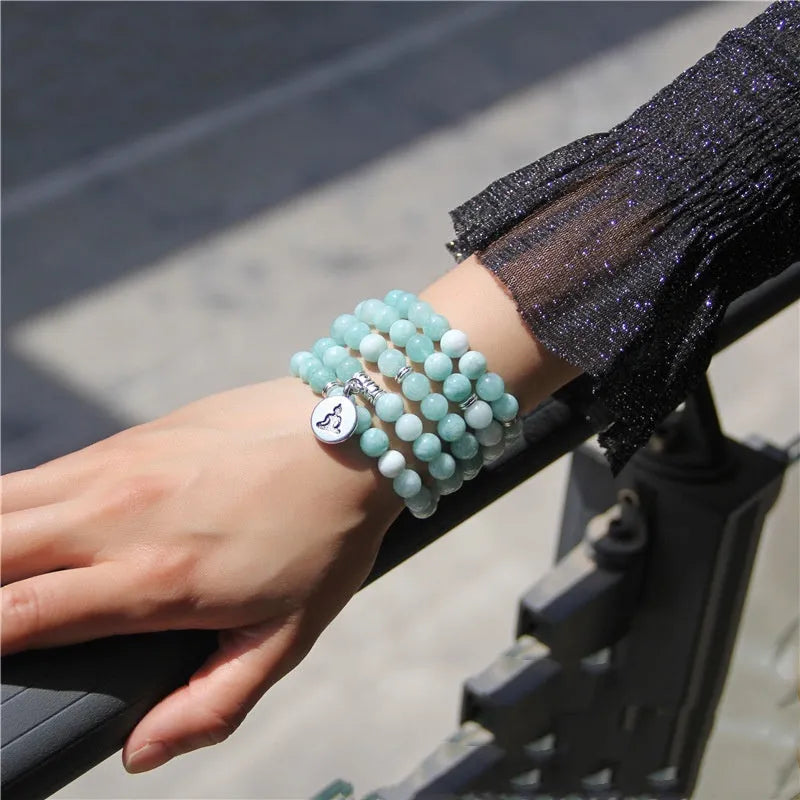 A women's vintage bracelet made of natural stone featuring a lotus geometry design.