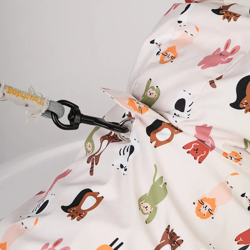 Beige cartoon dog raincoat with waterproof PU coating shown in small animal or cat head design