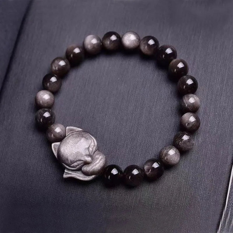 Black obsidian bracelet with fox ring charm and adjustable closure