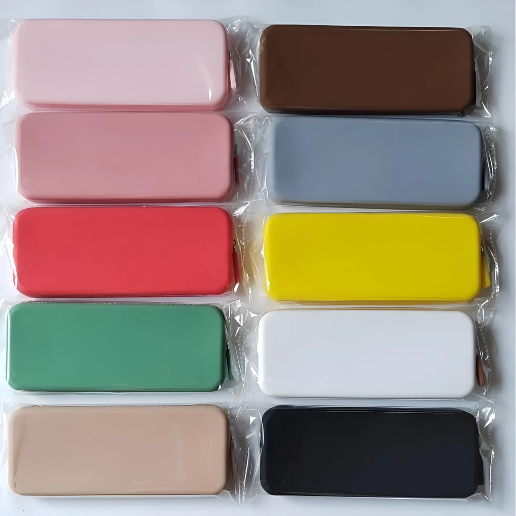 Slim black silicone makeup brush storage bag with zipper, shown next to makeup brushes.