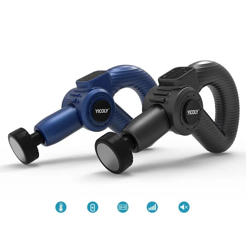 Black smart muscle massage gun with five attached massage heads on a table.