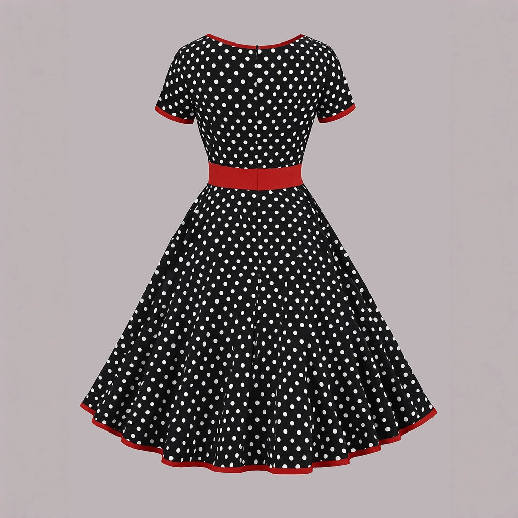 Multicolour polka dot pleated dress with square collar and short sleeves.