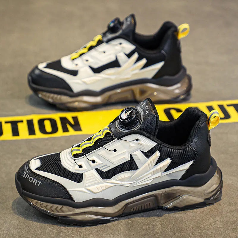 Men's black rotating button platform casual sneakers with mesh upper on a rubber sole.