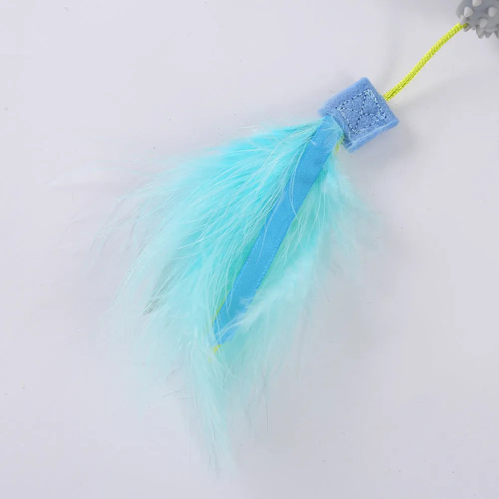 Blue cat toy wand with suction cup, double haired prick head, and plastic grinding teeth element.