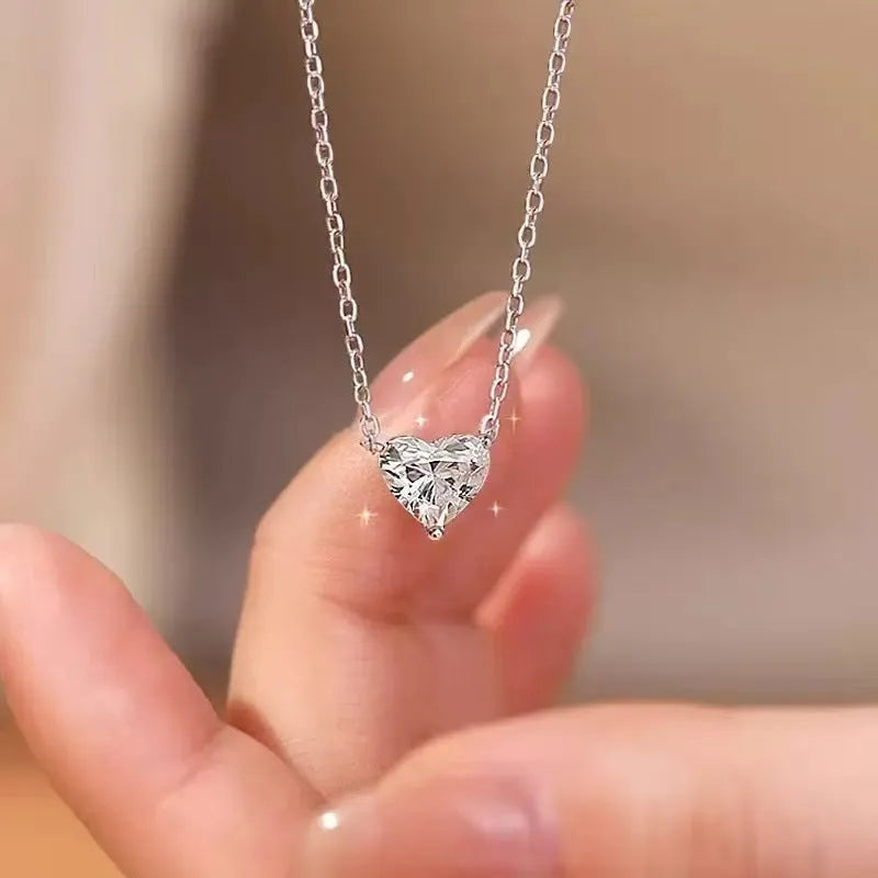 Silver-colour women's necklace with heart-shaped pendant in simple refined style