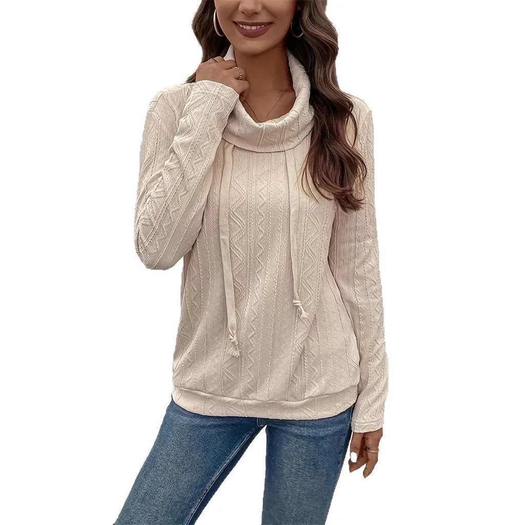 Apricot hooded pullover sweater with drawstring and long sleeves on a mannequin