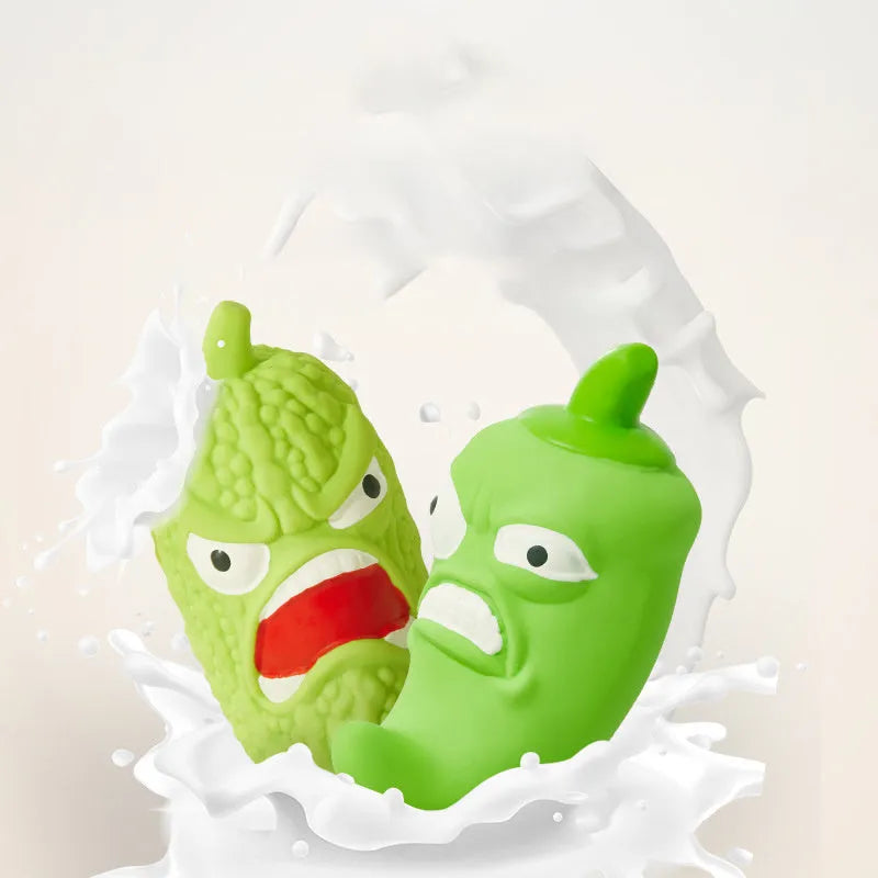 Bitter melon shaped or chili shaped durable plastic dog chew toy with textured surface for teeth cleaning.