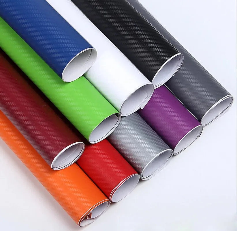 Roll of 3D carbon fiber patterned vinyl sticker for car decoration, showing textured surface