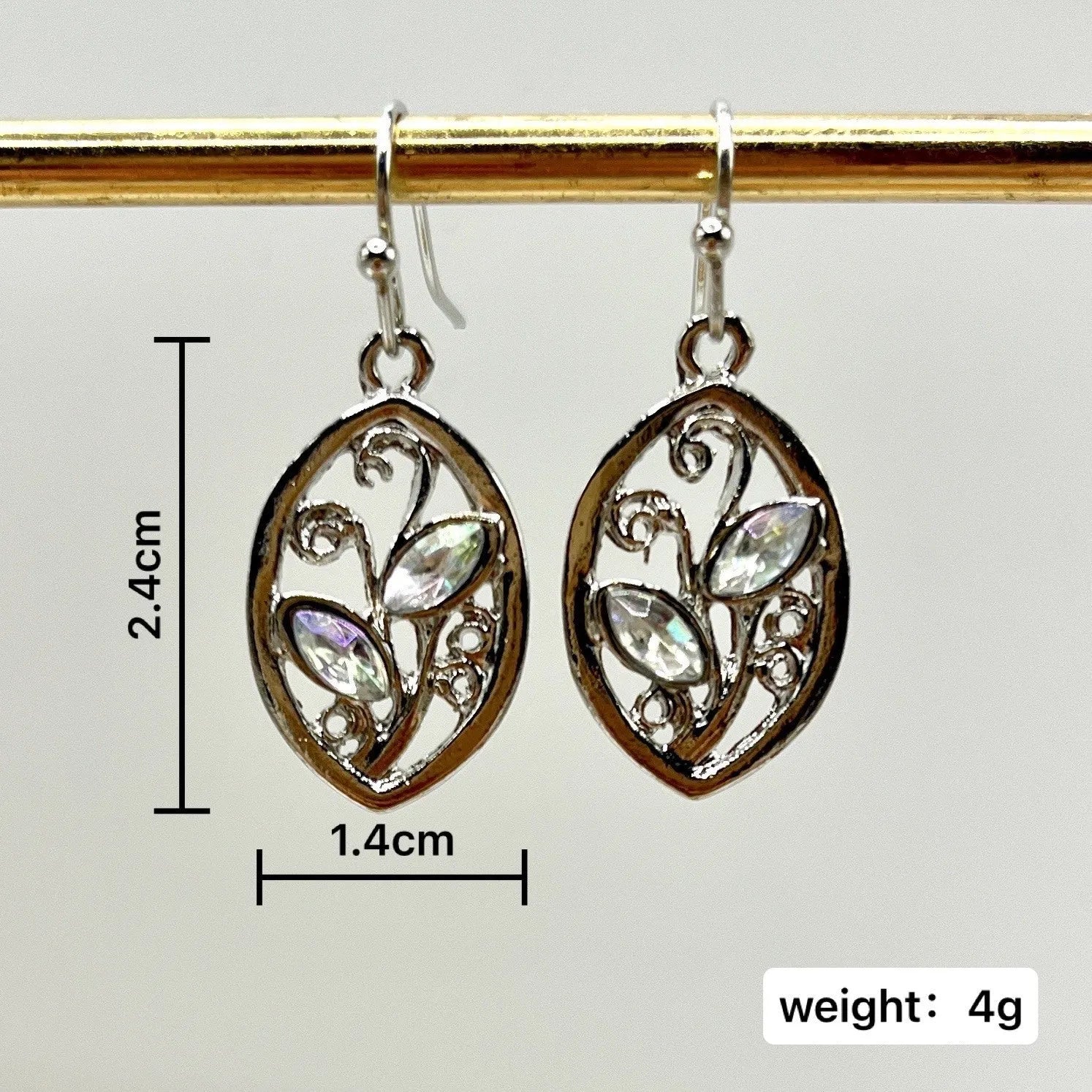 Silver leaf-shaped earrings with colourful embedded moonstones for women