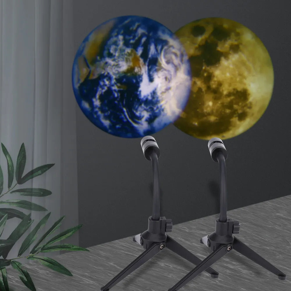 USB-powered Earth and Moon projection lamp with flexible hose bracket on a wooden table.