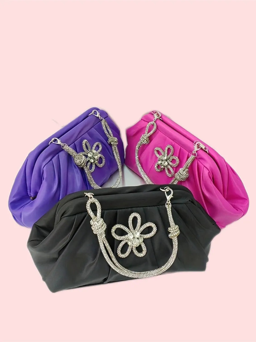 Women's soft polyester messenger bag with chain detailing and diamond pattern in black colour