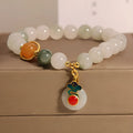Women's ice jade bracelet with pearl accents and traditional Xiangyun peace buckle closure