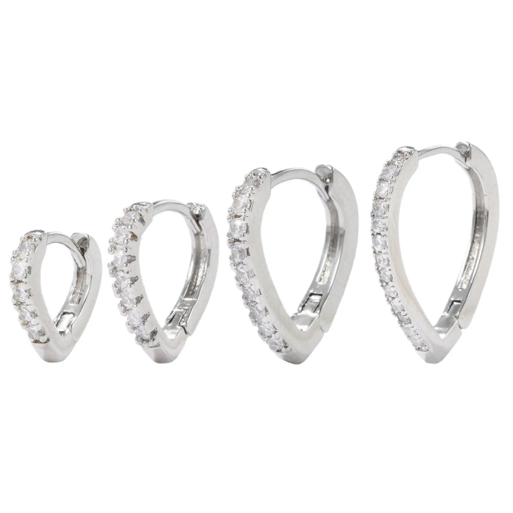 Copper ear clip with geometrical heart design in gold or white electroplated finish