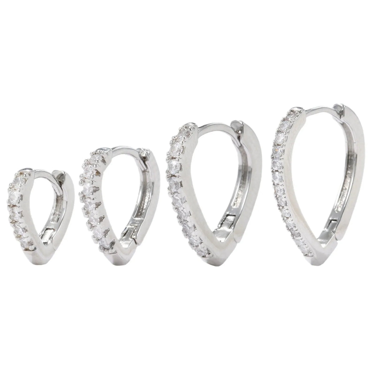 Copper ear clip with geometrical heart design in gold or white electroplated finish