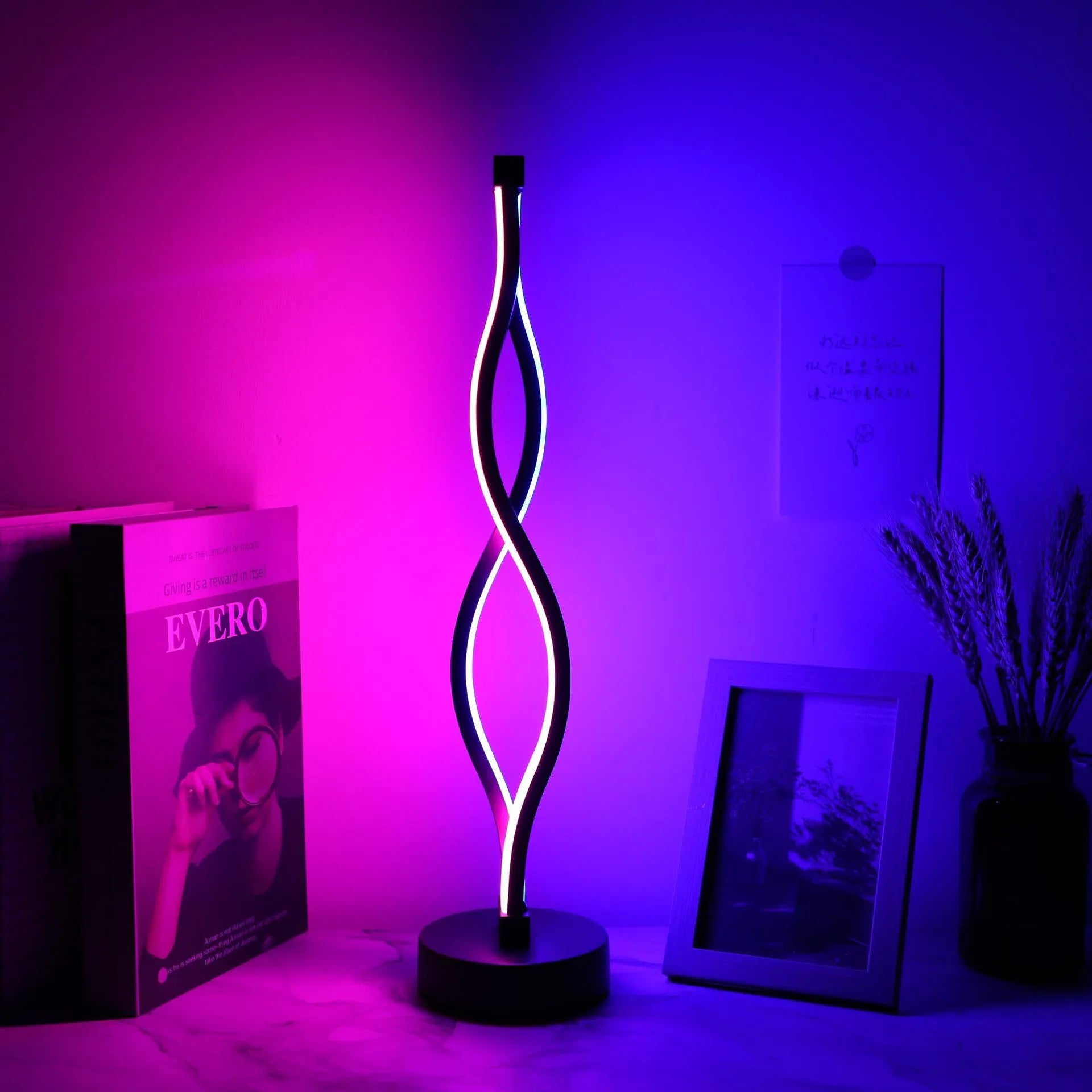 Black aluminium desk lamp with touch dimming controls and three colour temperature buttons