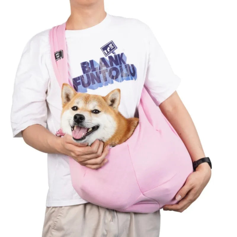 Folding cat carrier backpack with mesh panels shown in a selection of colours including black, blue and pink