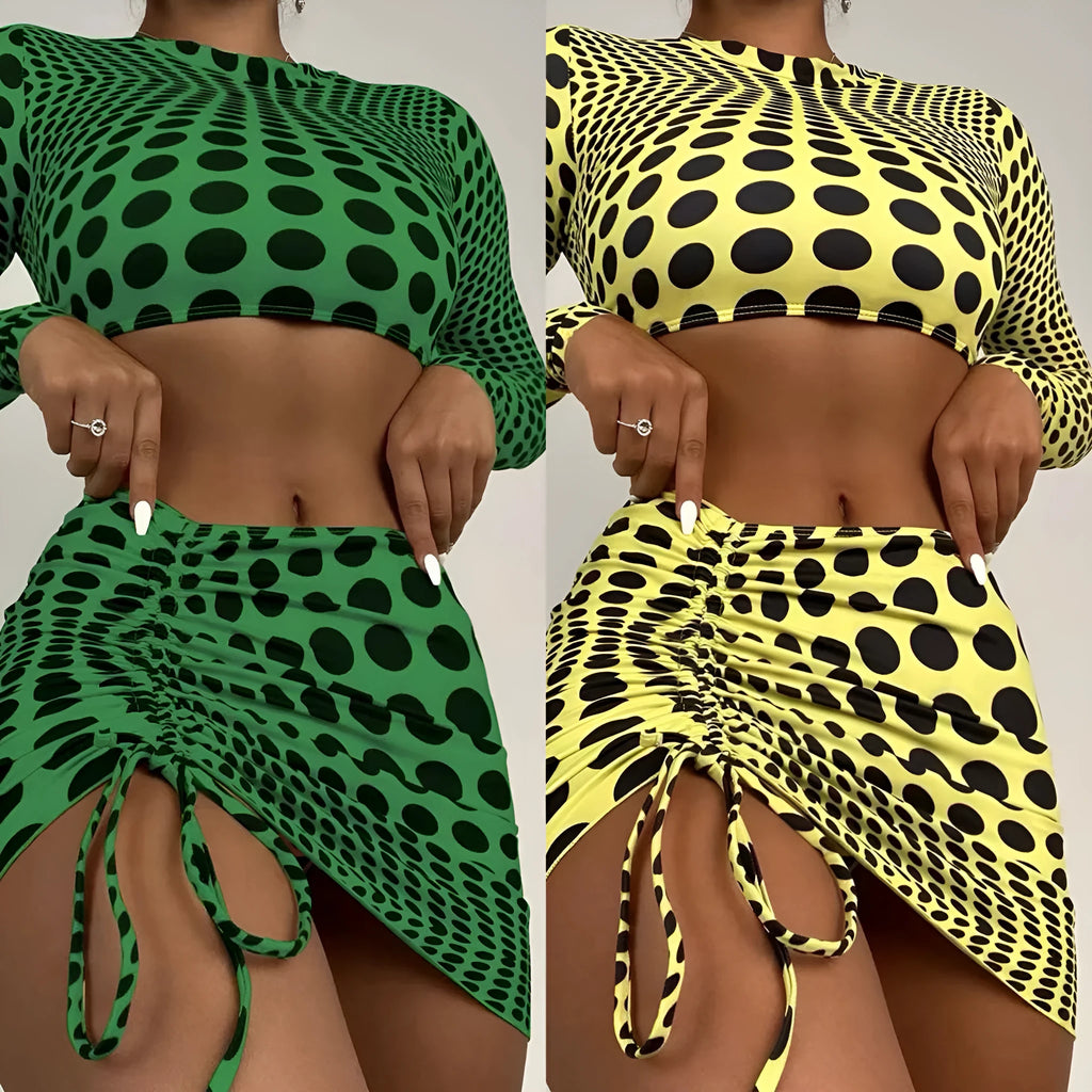 Women's green polka dot three-piece swimsuit set with halterneck bikini top and matching skirt