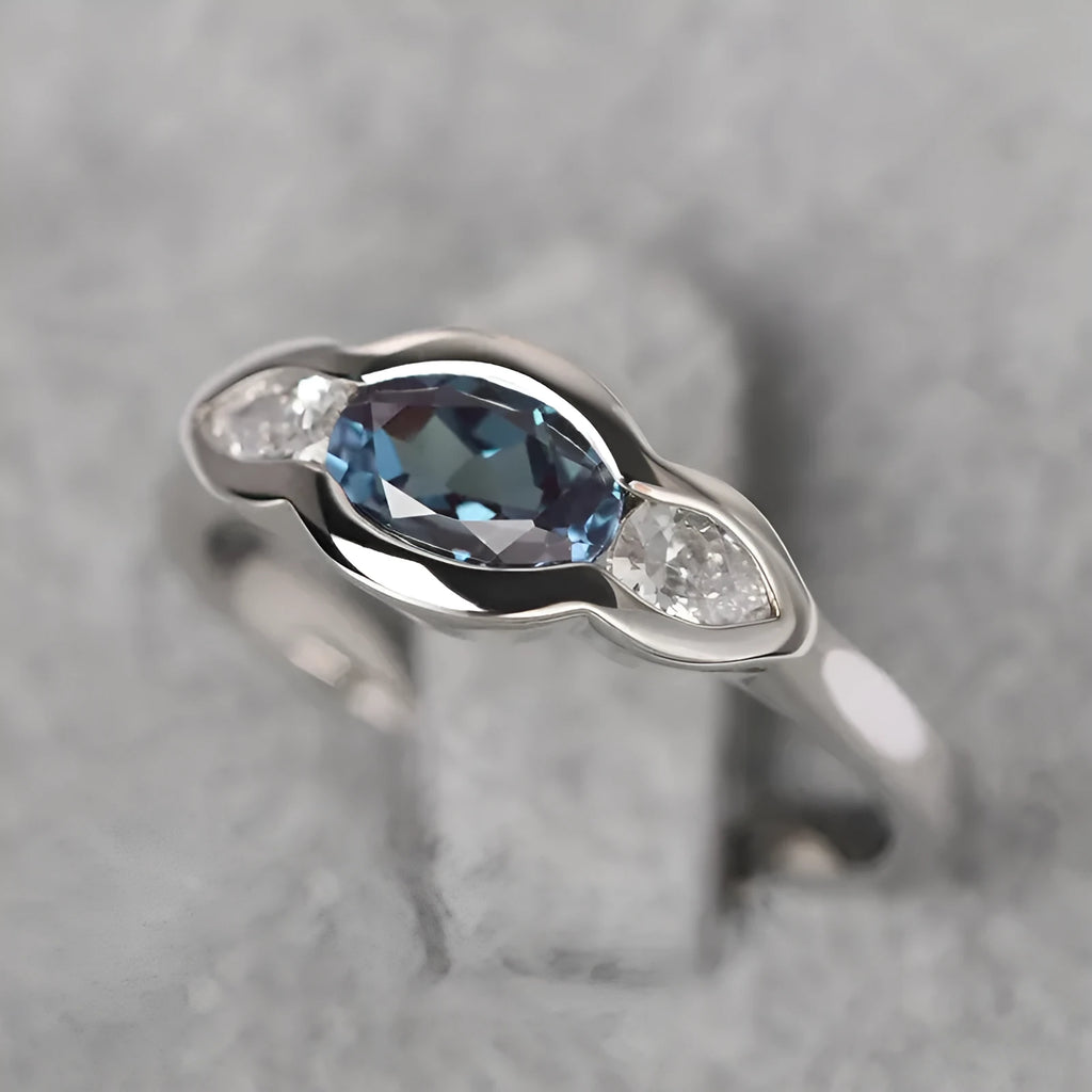 Geometric ellipse copper ring with zircon stone inlay and white gold finish
