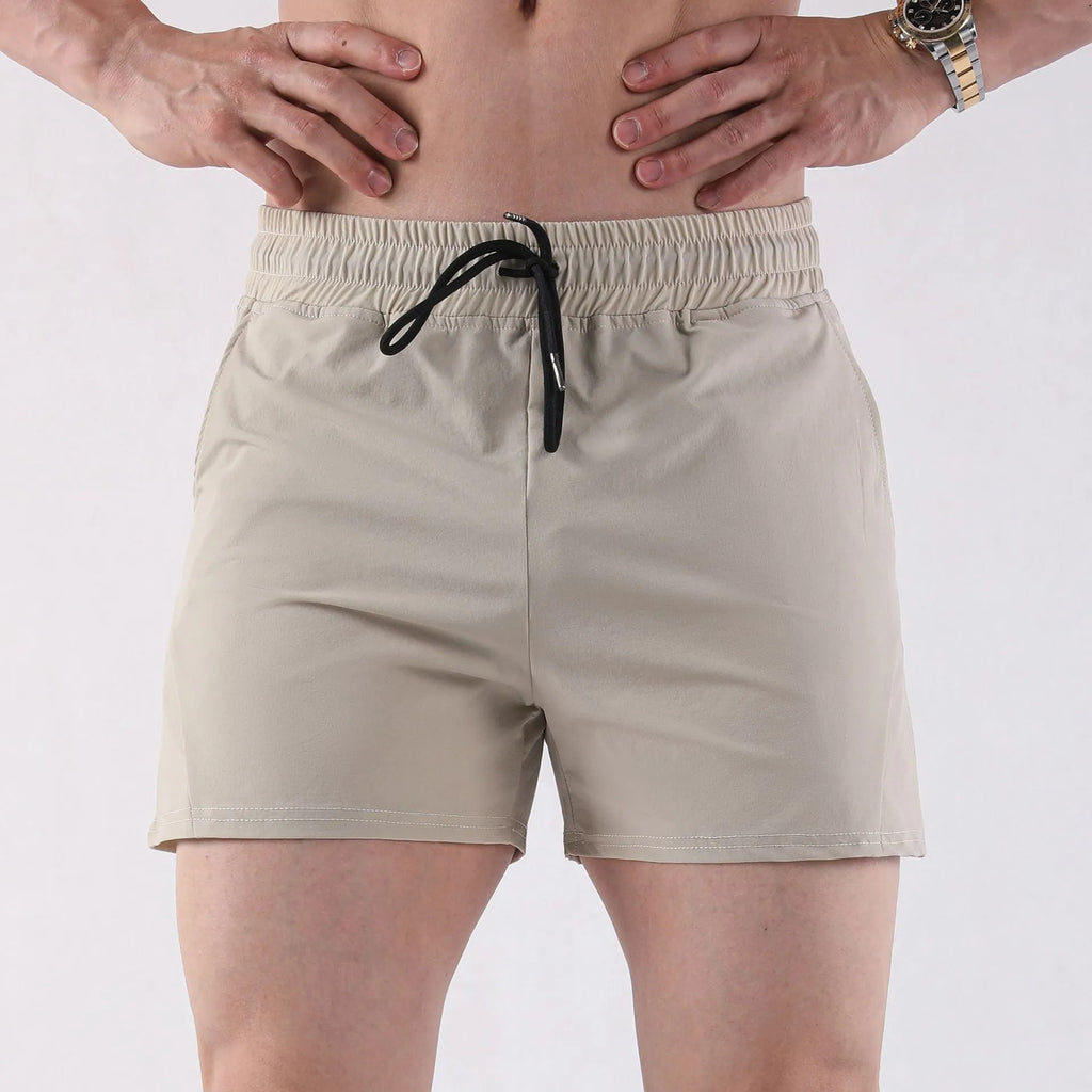 Men's slim fit basketball shorts in grey, black, apricot or green colours with elastic waistband