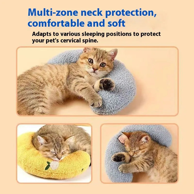 Blue U-shaped cat neck protection pillow on pet bed