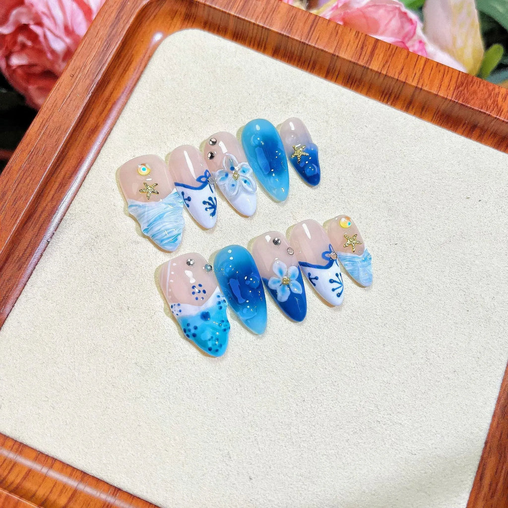 Blue hand-painted carved transparent ice fake nails in plastic material for women