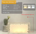 Clear acrylic geometric ice cube shaped night light with colour changing LED lights inside.