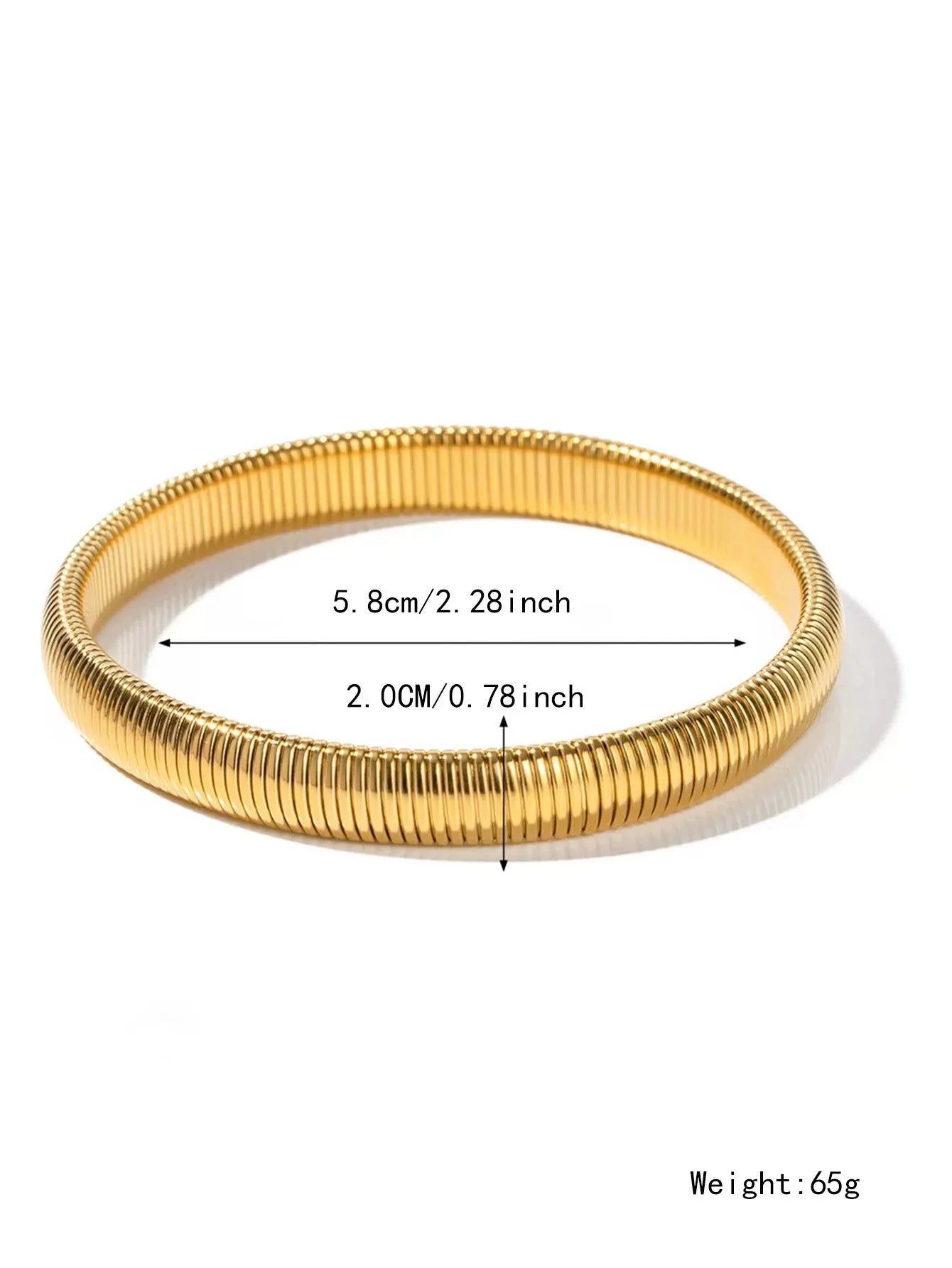 Gold titanium steel bracelet with exaggerated vertical stripe ring pattern and elastic band.