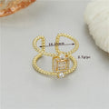 U-shaped open ring with adjustable opening in 14K gold plating over copper, asymmetric design