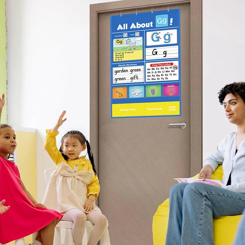 Children's alphabet learning sleeve chart with letter cards, word cards, and picture cards on a large 60x40 cm table mat.