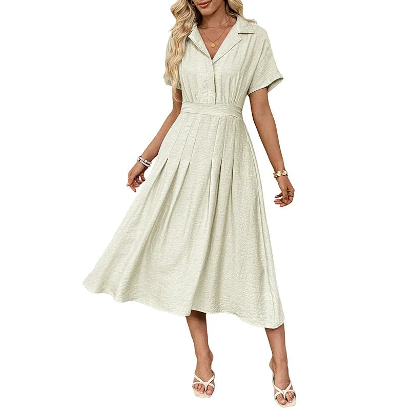 Light green lapel shirt dress with a waist tie and skirt pockets on a model.
