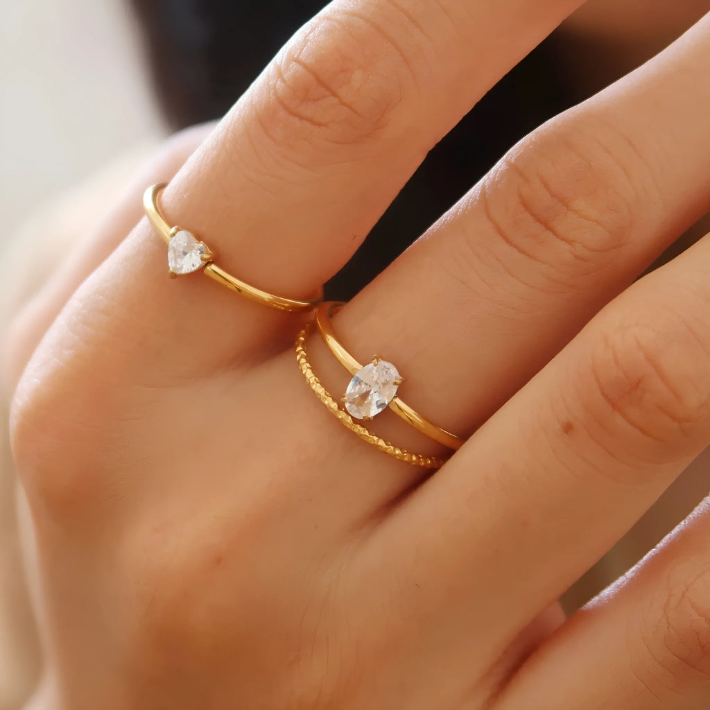 Golden heart-shaped stainless steel ring for women available in sizes 6-8