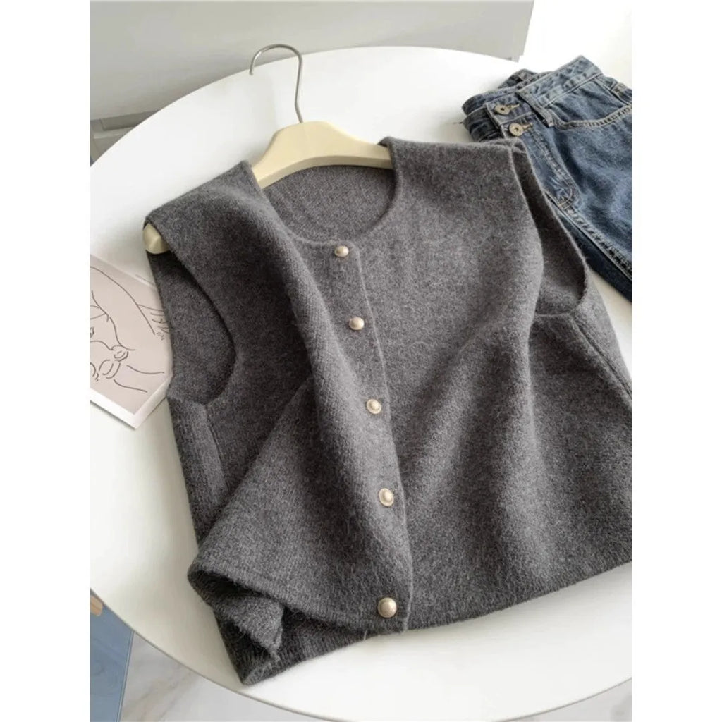 Thin polyester pullover casual top with half sleeves in Angora red, shown on a hanger.