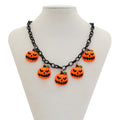 Mixed colour cartoon ghost and pumpkin acrylic pendant on a chain for Halloween.