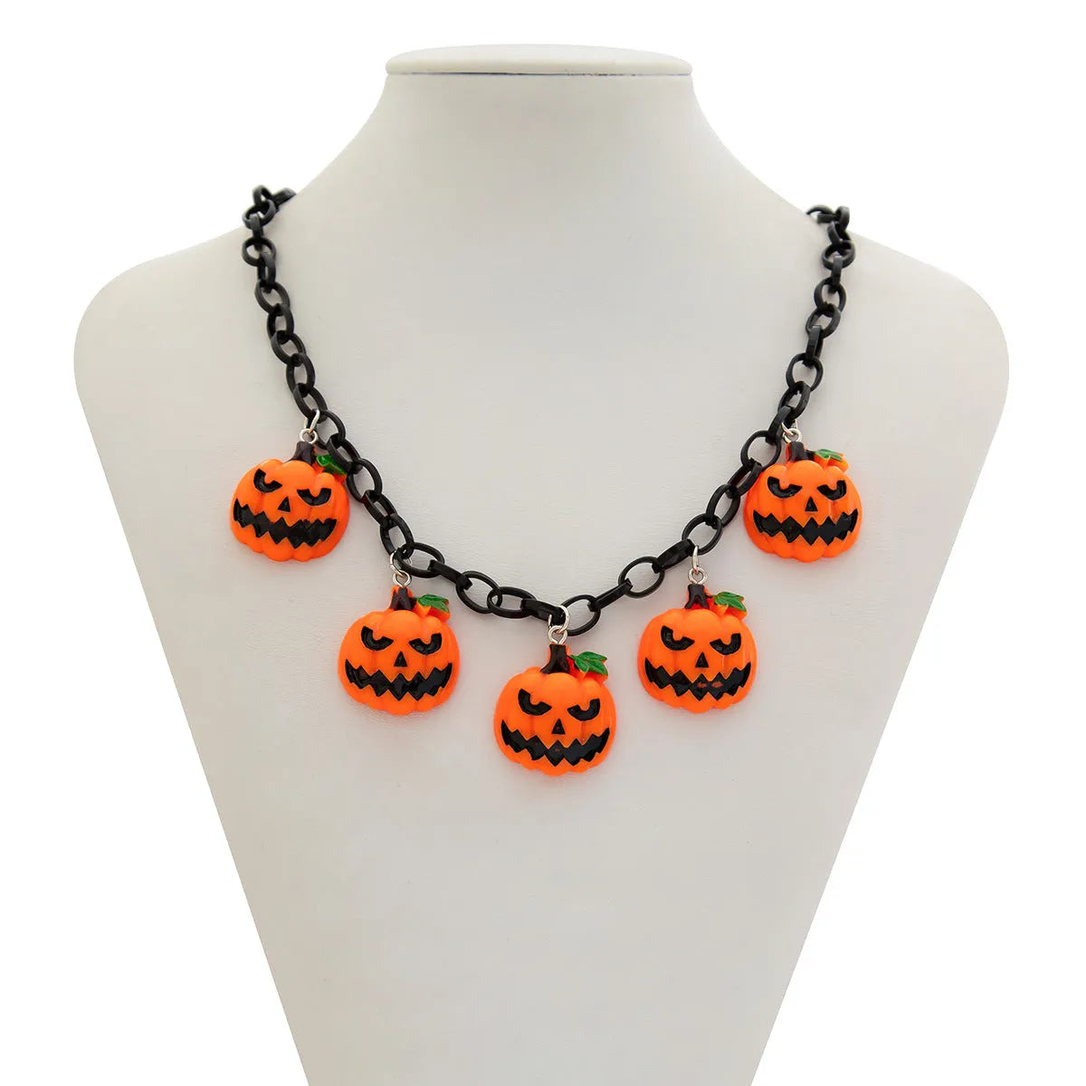 Mixed colour cartoon ghost and pumpkin acrylic pendant on a chain for Halloween.