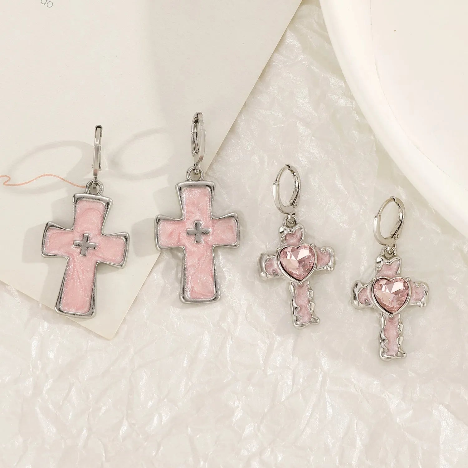 Women's alloy cross crystal earrings in white, black, and silver with geometric and character designs