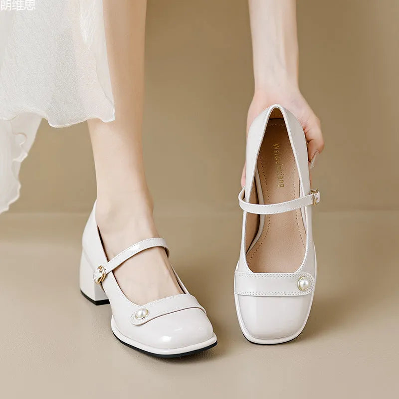 Women's patent leather chunky heel pumps with buckle closure and square toe