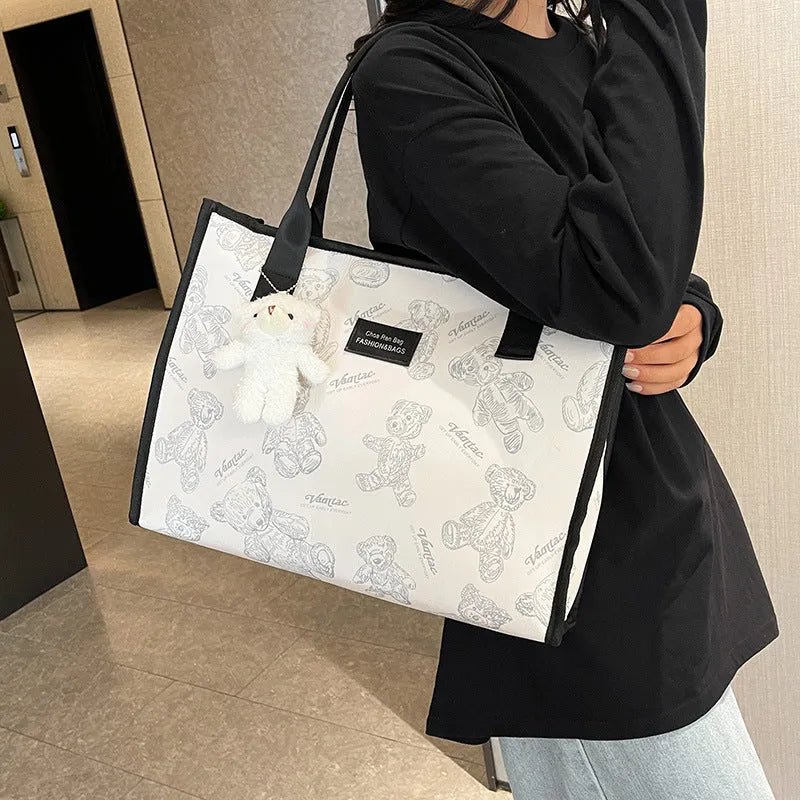 Women's printed canvas tote bag with rhombus pattern in black or white colours