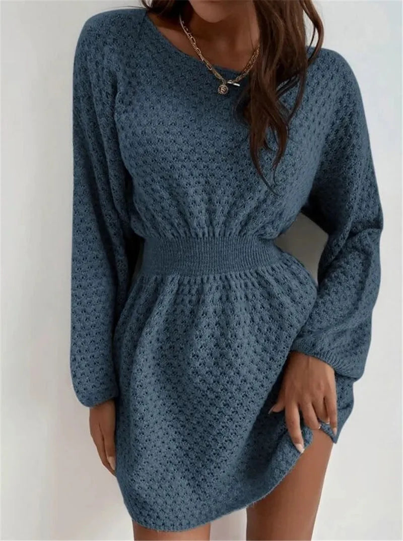Blue women's knitted dress with crocheted flower details and fitted waist design