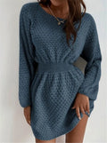 Blue women's knitted dress with crocheted flower details and fitted waist design