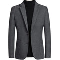 Men's short woolen suit jacket in grey showing slim fit non-iron design for autumn