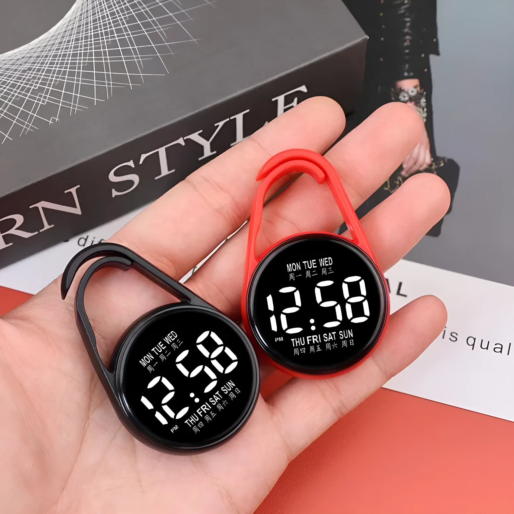 LED luminous electronic digital watch with plastic strap, shown in one of ten available colours on a wrist.