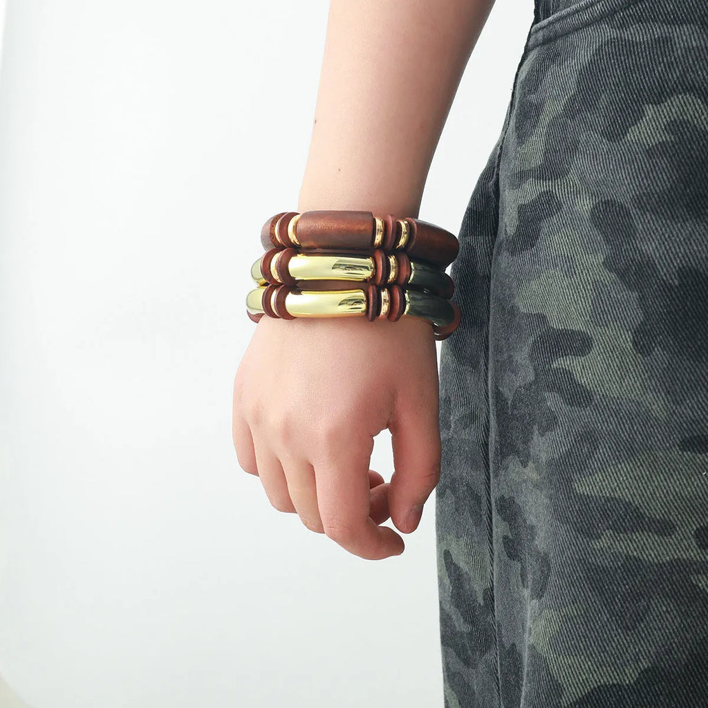 Women's layered alloy necklace and bracelet set with round pendants and regular chain design