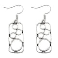Geometric earrings with round ring and irregular square design in antique silver colour