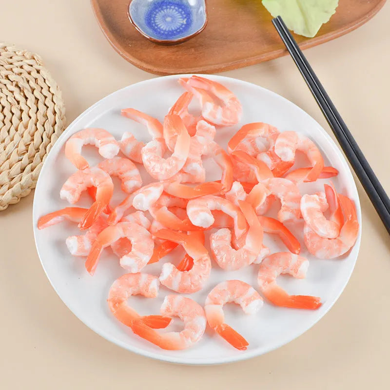PVC injection moulded shrimp keychain with door buckle fastener on white background