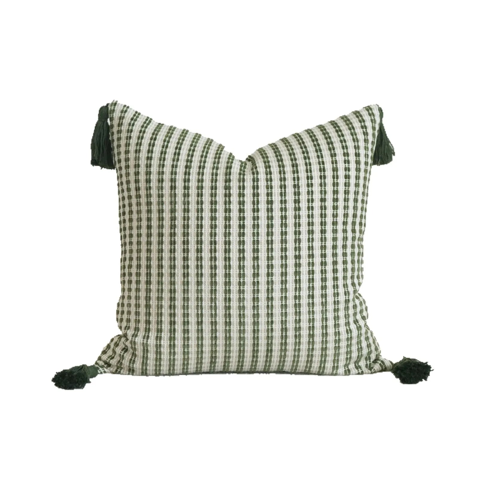 Green patterned cotton linen decorative pillow on a bed, shown in striped, botanical, and leaf designs.